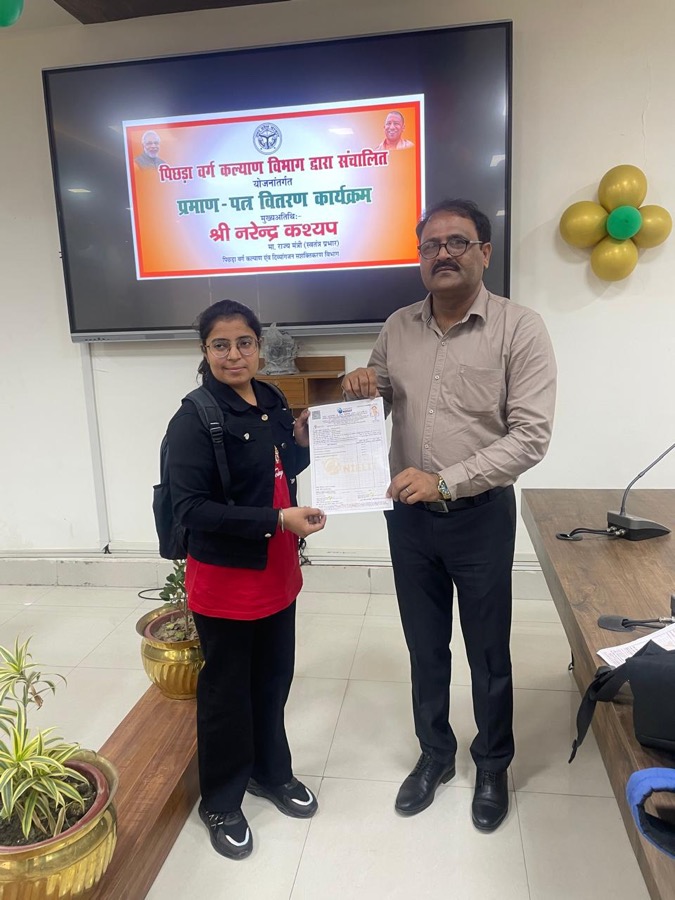 Student receiving free computer training certificate